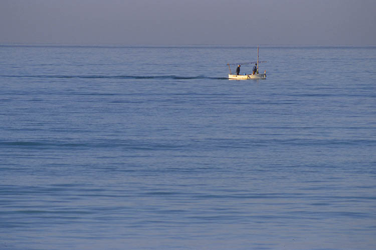 Fishing boat off shore Platja de Palma - click to go to next image