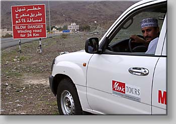 bilingual warning of winding road bilingual warning of winding road