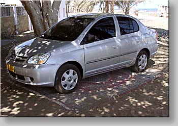 car parked on a carpet at Sohar