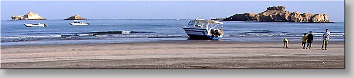Diving boat grounded by low tide