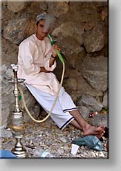 smoking a water pipe at a picnic at at Wadi Bani Khalid
